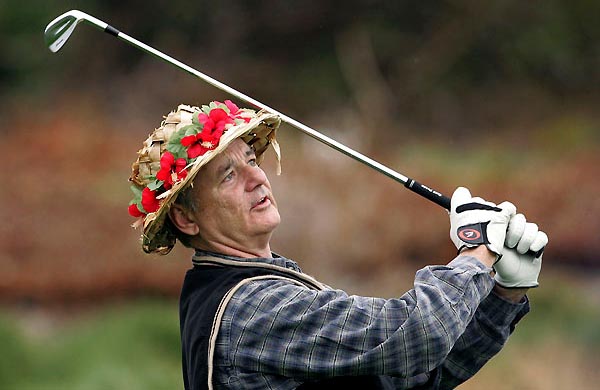 Bill Murray: abrindo a carteira para ter recordação de sua primeira vitória no torneio de golfe de Pebble Beach