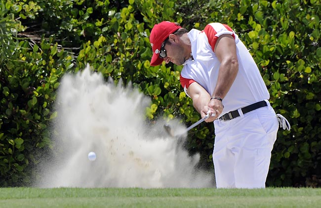    Rubinho em ação, em torneio de golfe: esporte predileto quando não está piltando em alta velocidade