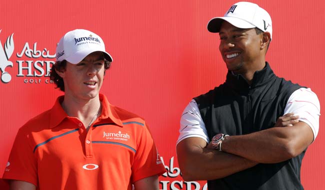   Rory e Tiger em Abu Dhabi: irlandês terminou na frente, mas americano é o favorito. Foto: Ross Kinnaird/Getty Images